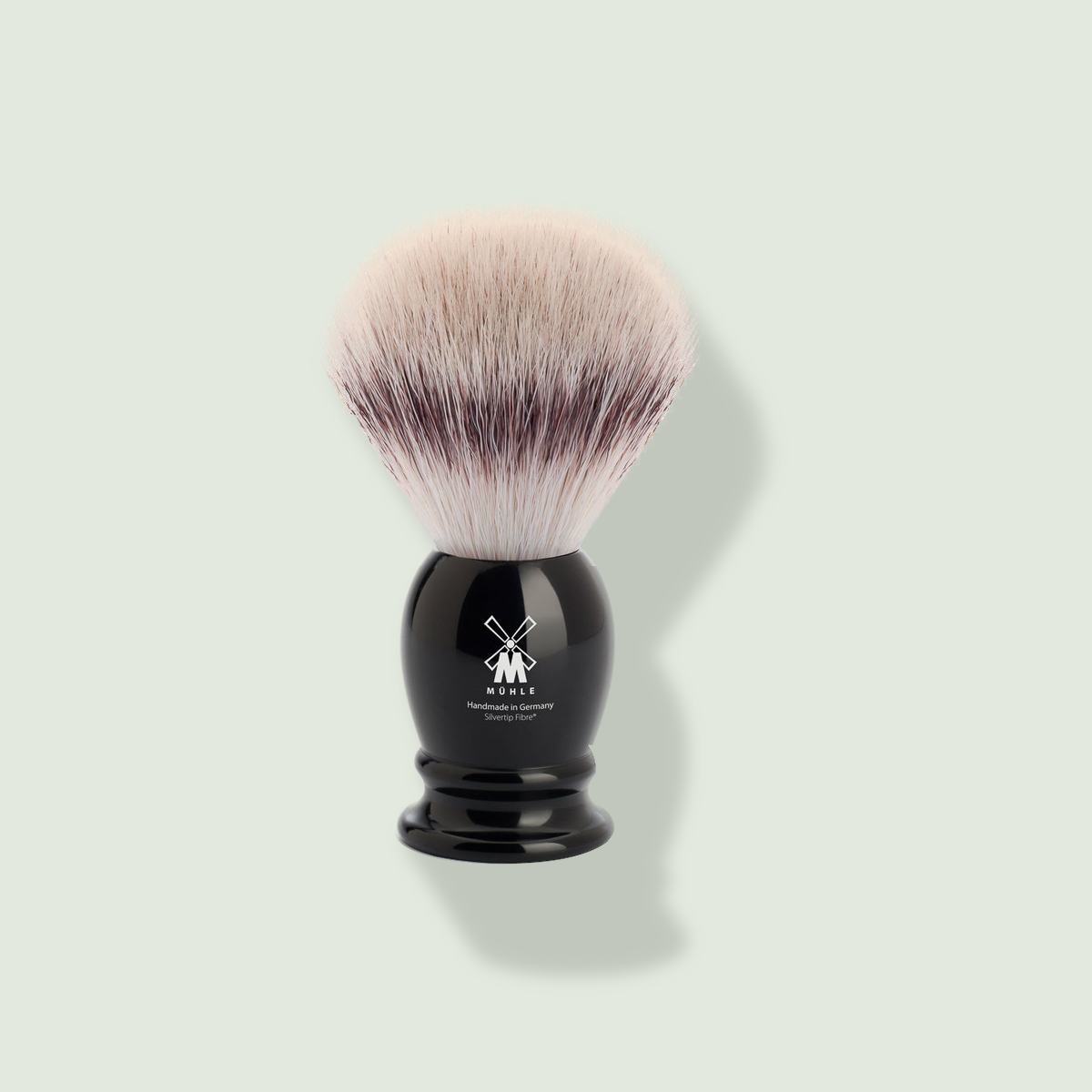 Mühle Silvertip Fibre skūšanās ota uz salvijas krāsas fona