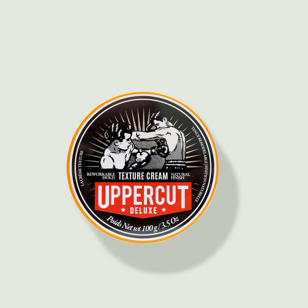 Uppercut Texture Cream uz salvijas fona